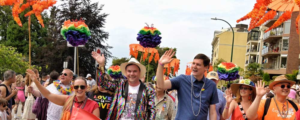 Premier David Eby and the BC NDP marching in the Vancouver Pride Parade