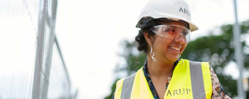 A woman working at a construction site.